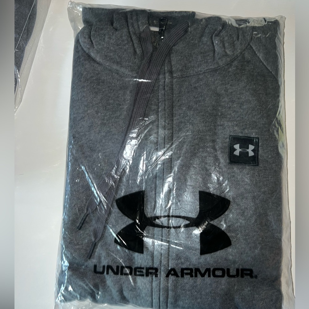 Under Armour: New grey in bag with tags, Zippered hooded sweatshirt.
